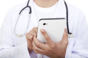 Doctor-with-Tablet-PC-300x199.jpg