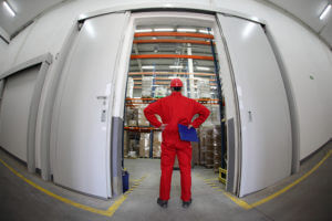 Worker-standing-in-doorway-300x200.jpg